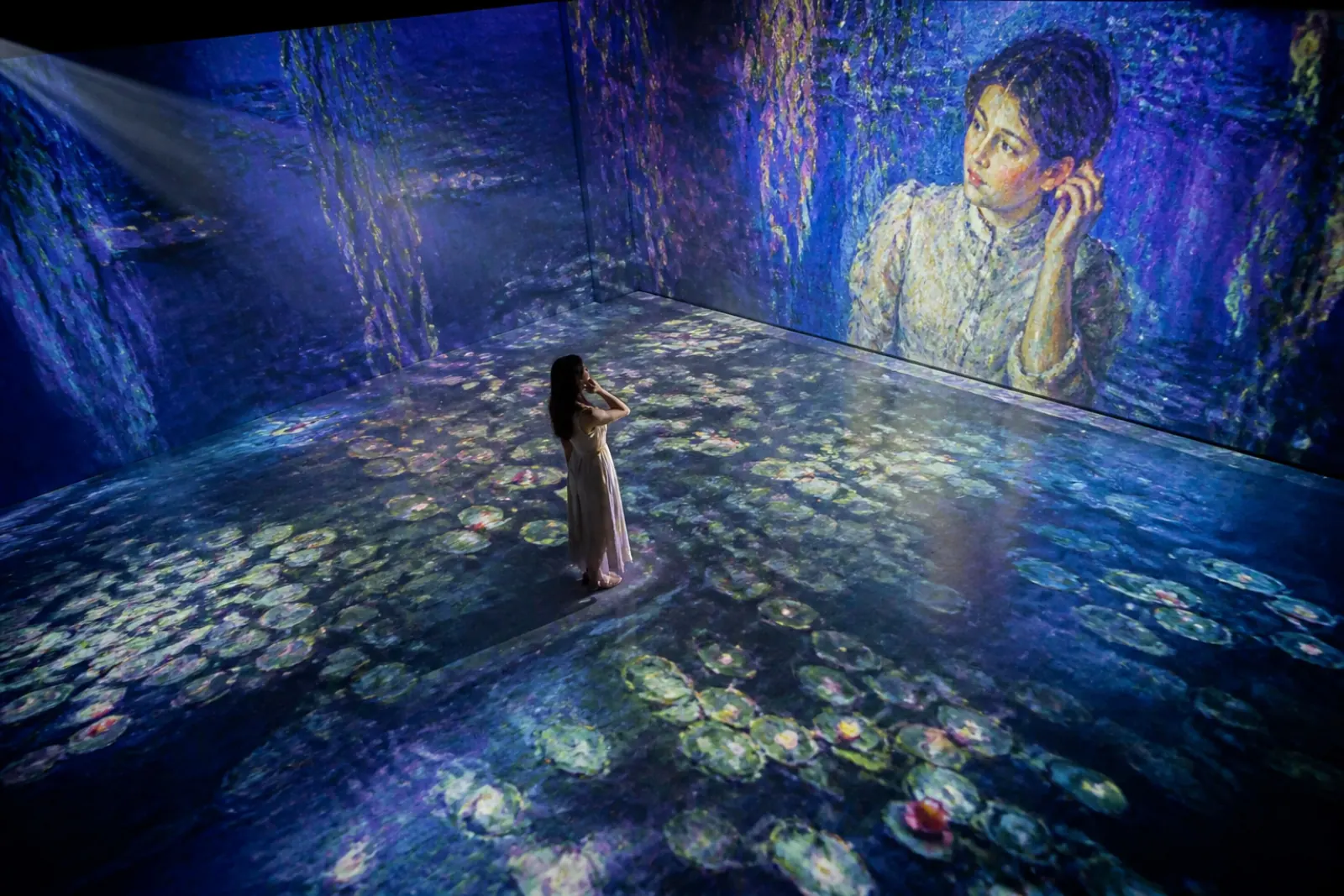 Immersive Monet water-lilies projection room